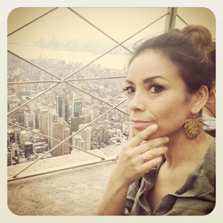 Emm Gryner posing at balcony